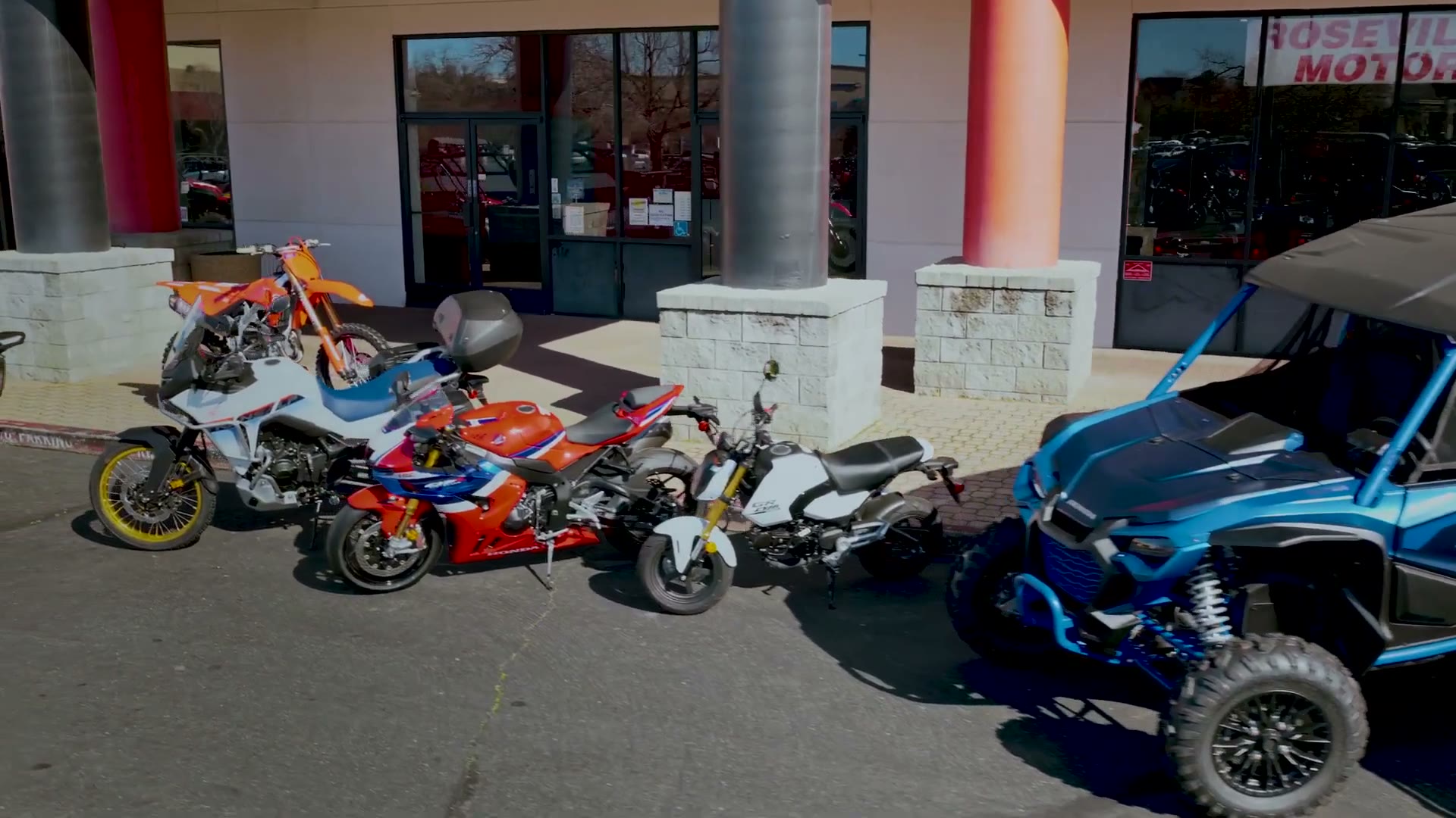 Honda motorcycles, ATVs and side-by-sides outside the Roseville Honda Motorsports showroom